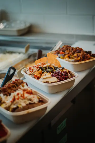Three loaded bowls on the kitchen counter