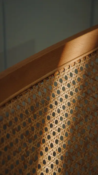 Hand-caned chair back, viennese weave on a beech frame.