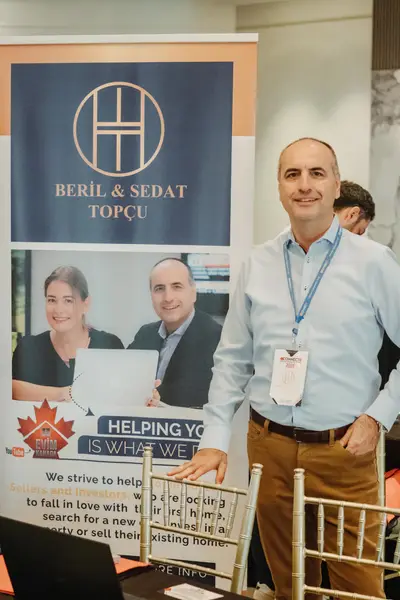 An exhibitor at their branded booth