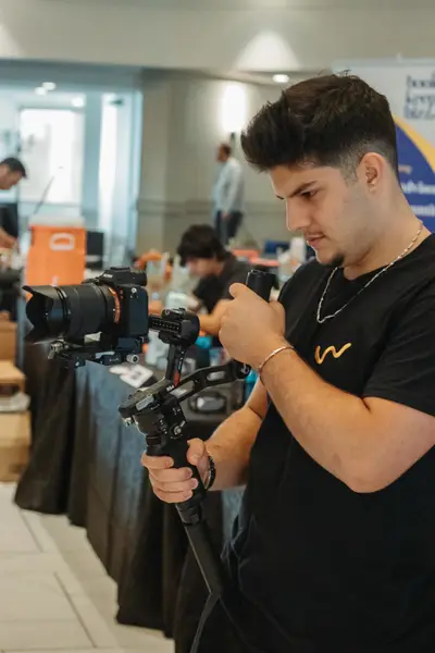 The FrameFlow videographer filming on the floor
