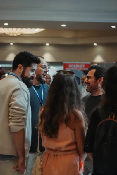 Attendees networking on the exhibitor floor