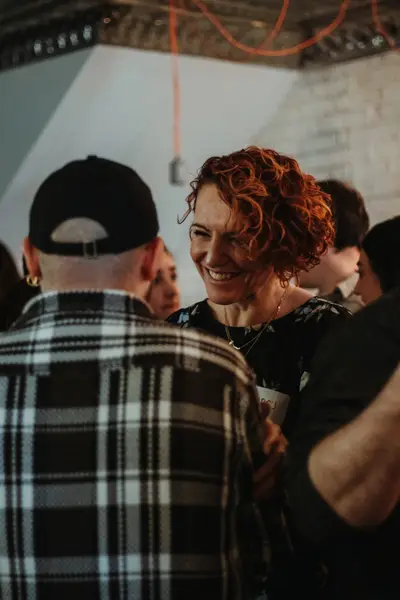 Guests laughing together in the crowd
