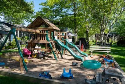 The playground sandpit with toys and slides