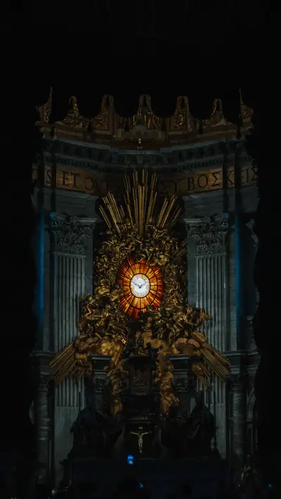 A gilded altar glowing in a dark interior
