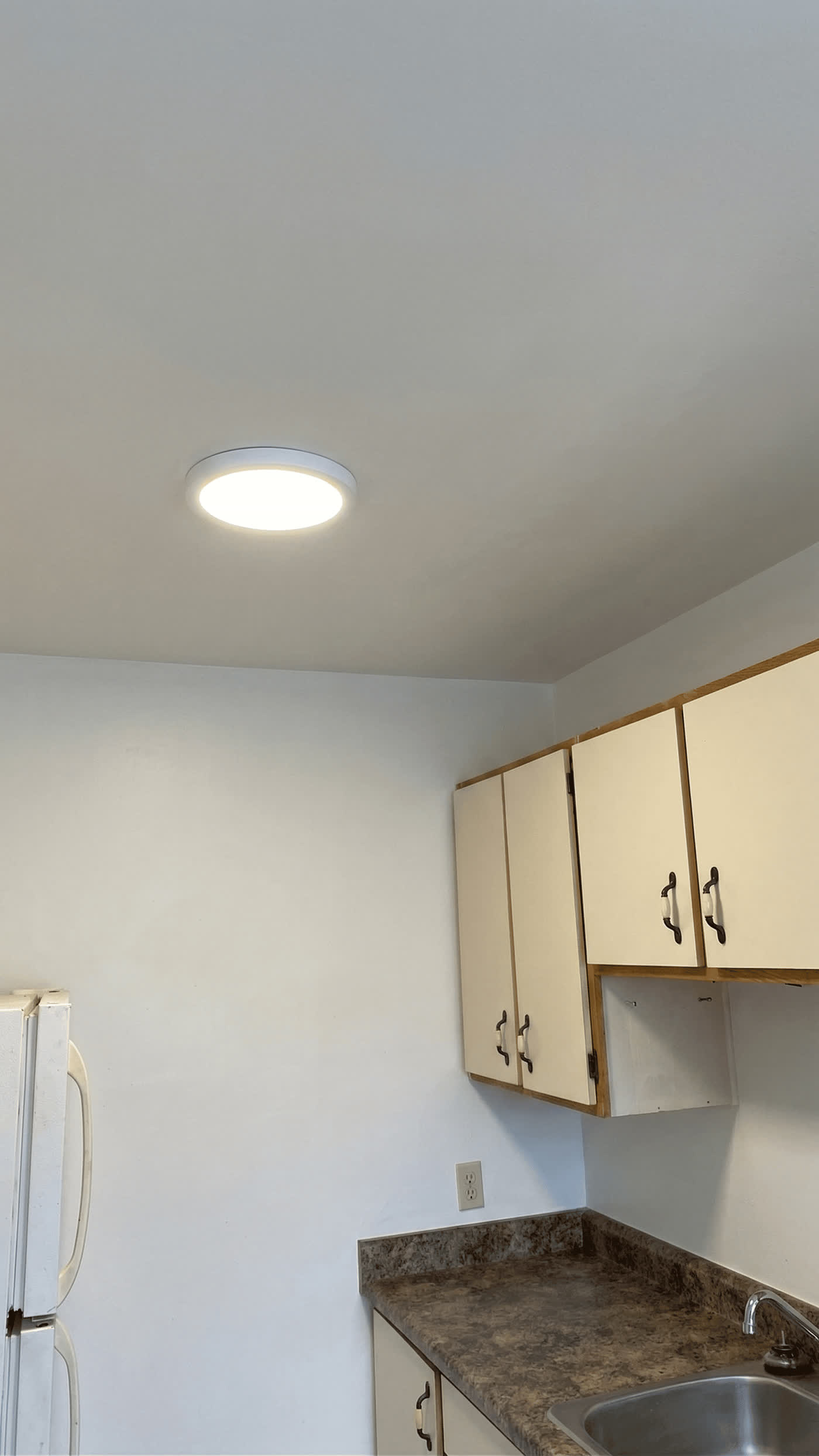 Kitchen ceiling restoration in Ottawa — collapsed ceiling rebuilt by Fidan Construction - after