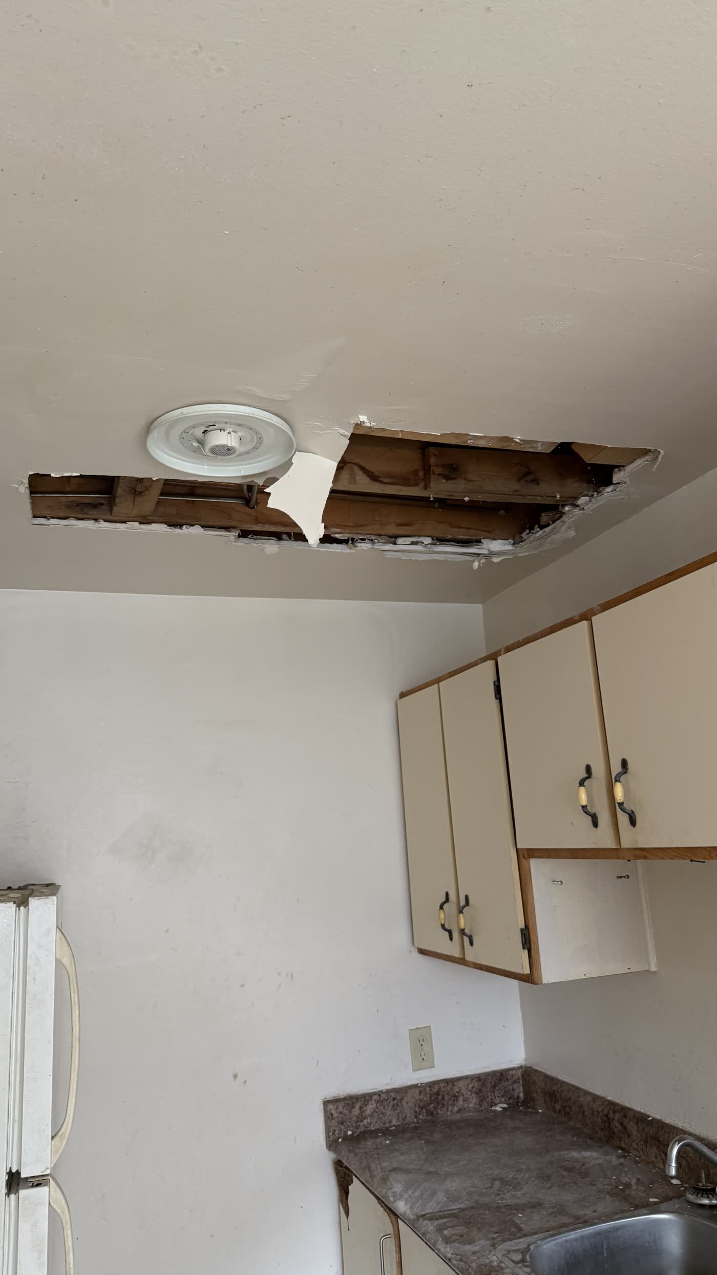 Kitchen ceiling restoration in Ottawa — collapsed ceiling rebuilt by Fidan Construction - before
